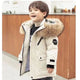 Boys' longline parka with fur-trimmed hood, zip fastening and flap pockets