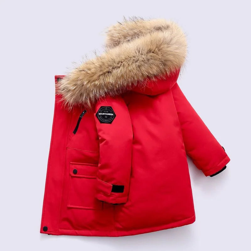 Boys' longline parka with fur-trimmed hood, zip fastening and flap pockets