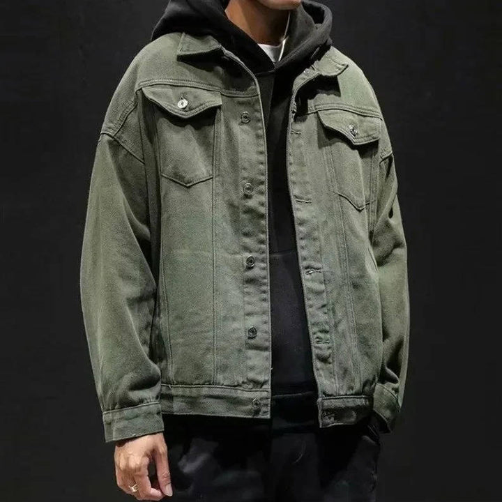 Men's button-front denim jacket with flap chest pockets and long sleeves