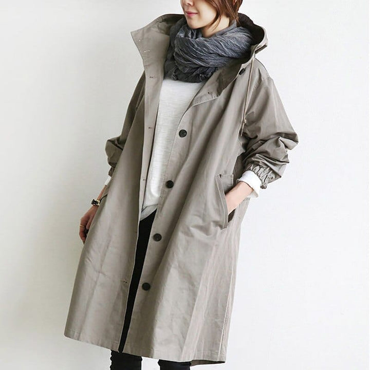Women's hooded trench coat with button front and side pockets