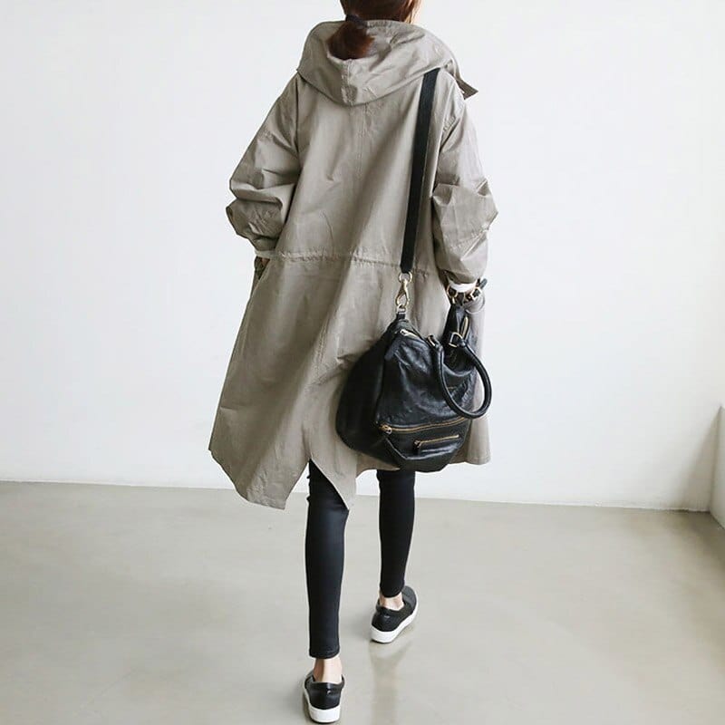 Women's hooded trench coat with button front and side pockets