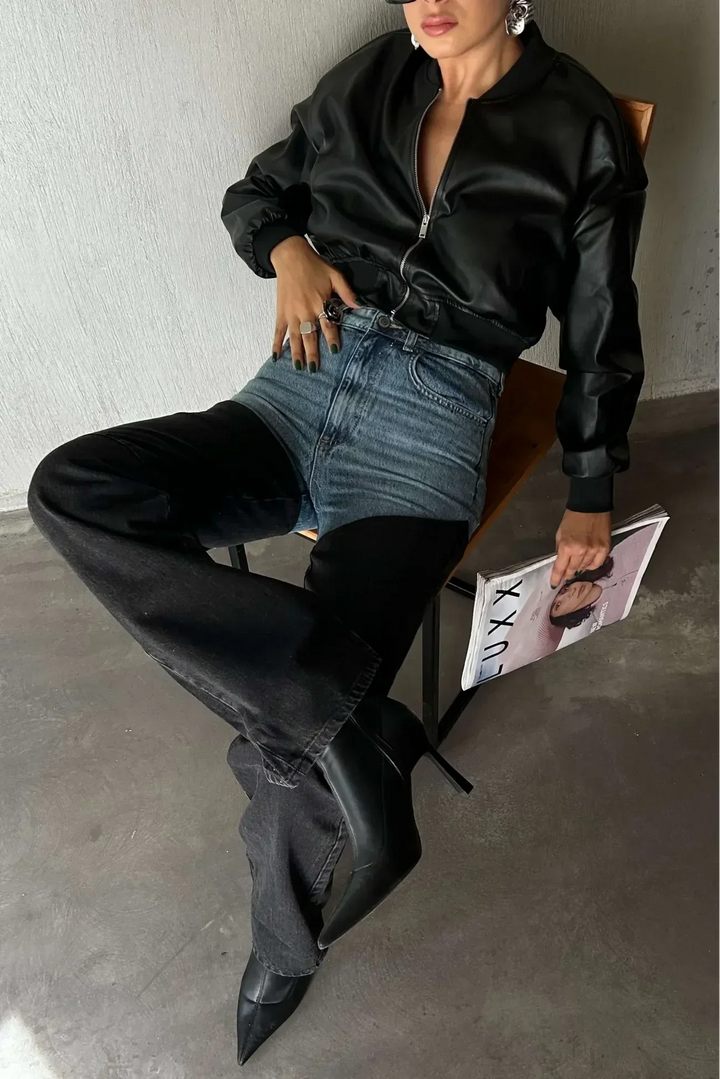 Women's two-tone high-rise straight-leg jeans with blue upper panels and black lower legs