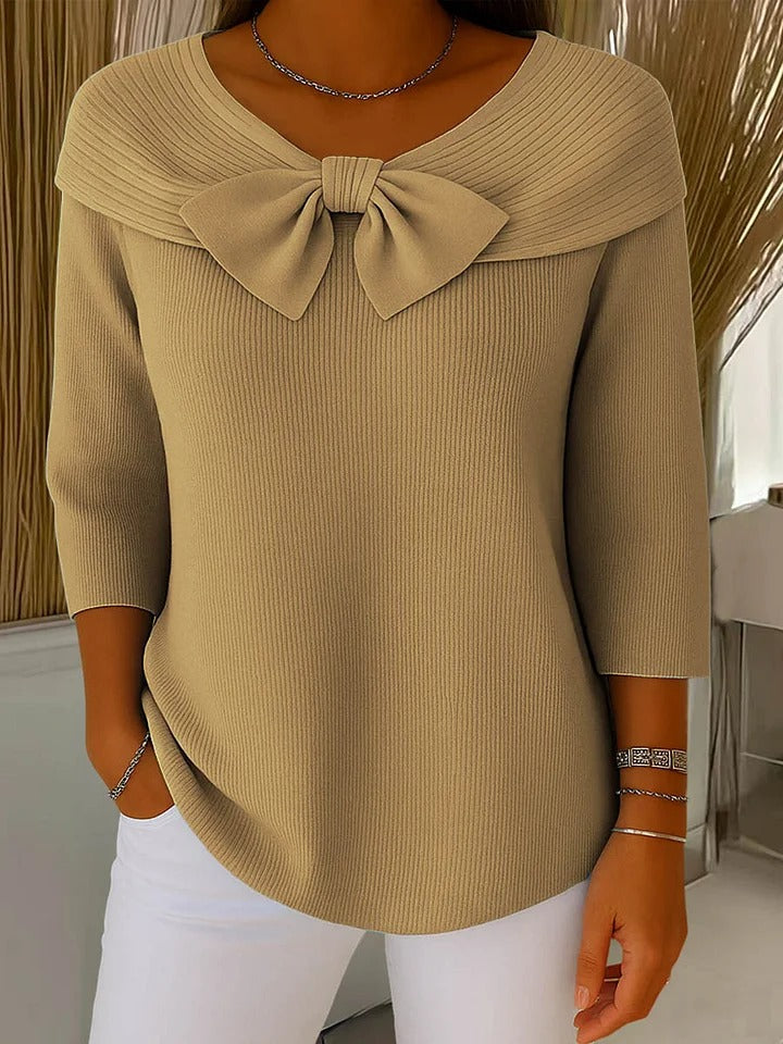 Women's ribbed jumper with large bow detail and three-quarter sleeves