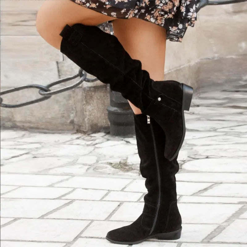 Women's slouch knee high boots with low heel, side zip and decorative straps