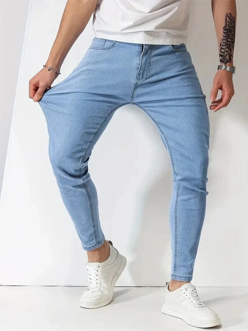 Men's slim fit jeans with five-pocket design and tapered legs