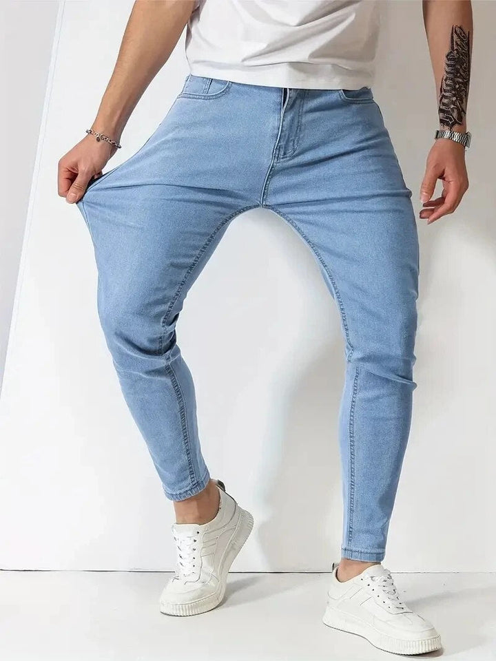 Men's slim fit jeans with five-pocket design and tapered legs