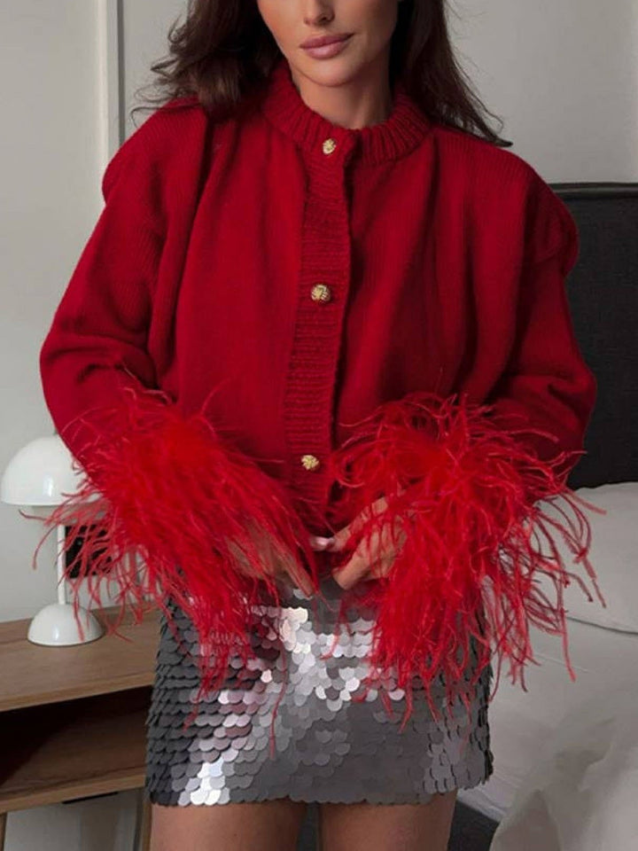 Women's cropped cardigan with feather-trimmed cuffs and button front