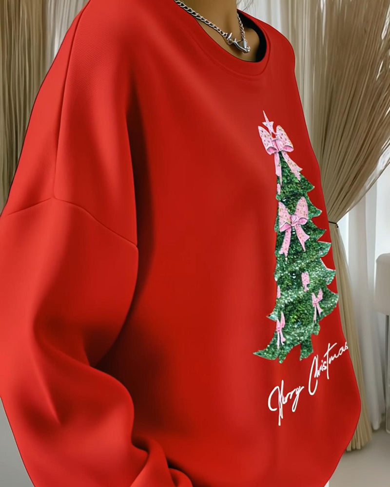 Women's long-sleeve Christmas sweatshirt with a Christmas tree and bow graphic