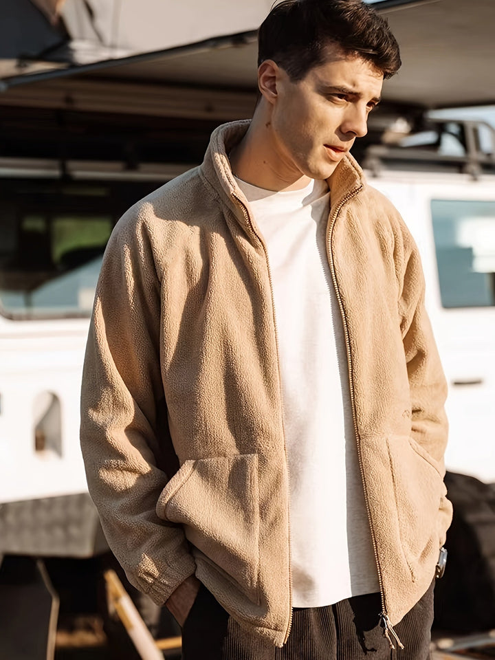 Men's beige fleece jacket with high collar, zip front and lower pockets