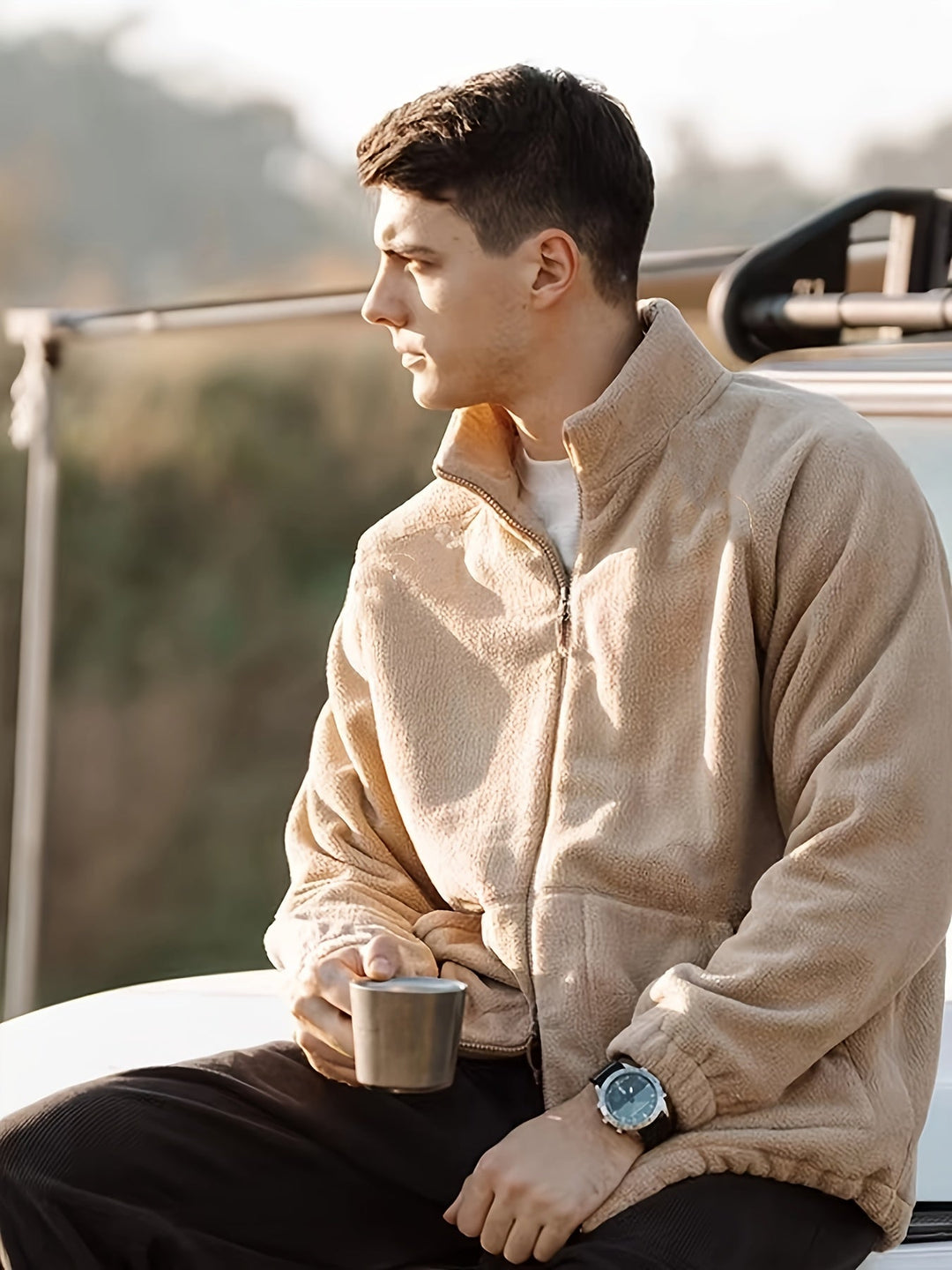 Men's beige fleece jacket with high collar, zip front and lower pockets
