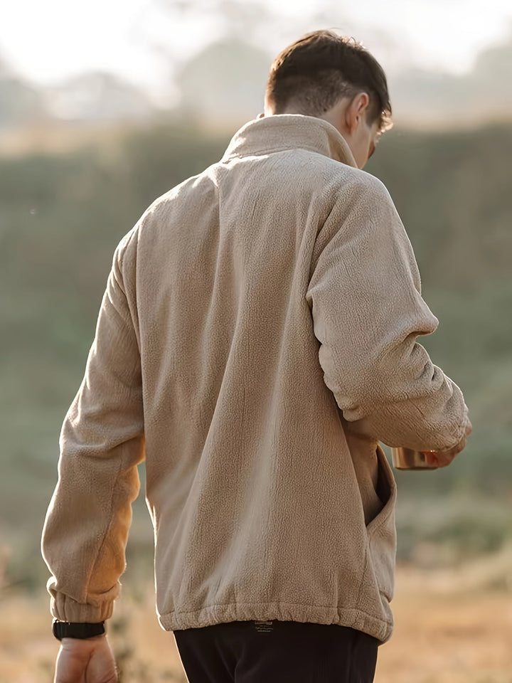 Men's beige fleece jacket with high collar, zip front and lower pockets