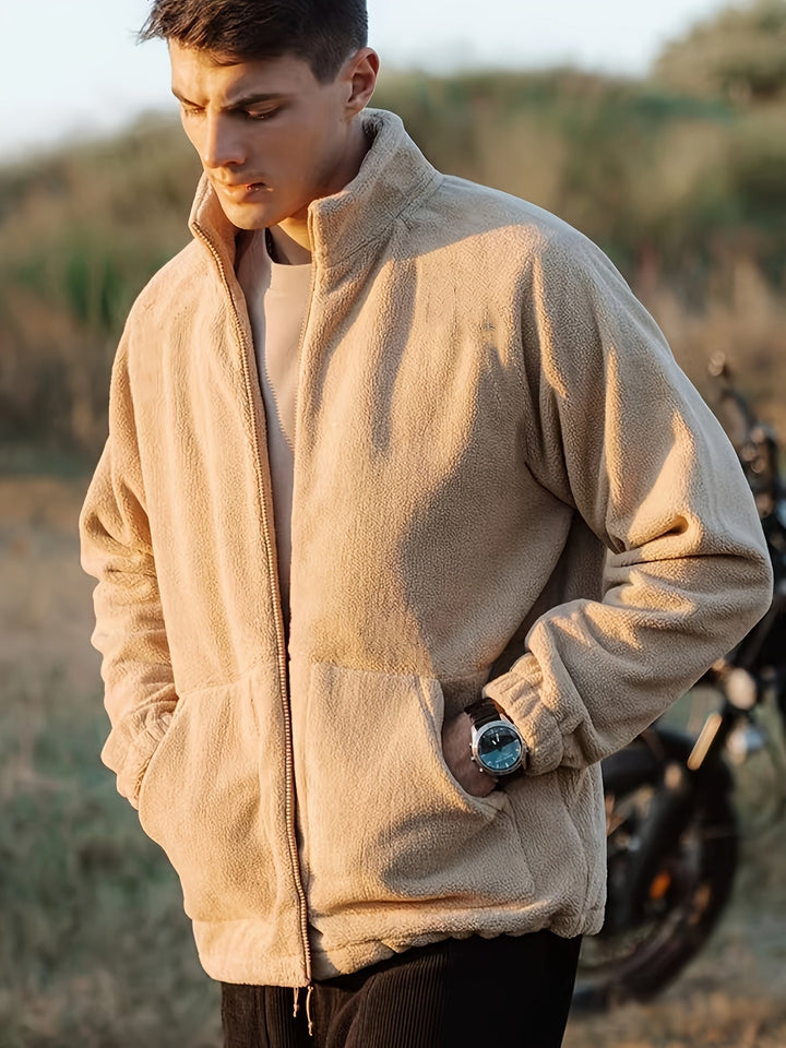 Men's beige fleece jacket with high collar, zip front and lower pockets