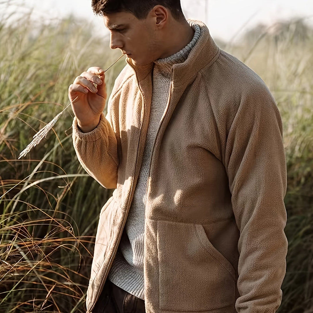 Men's beige fleece jacket with high collar, zip front and lower pockets