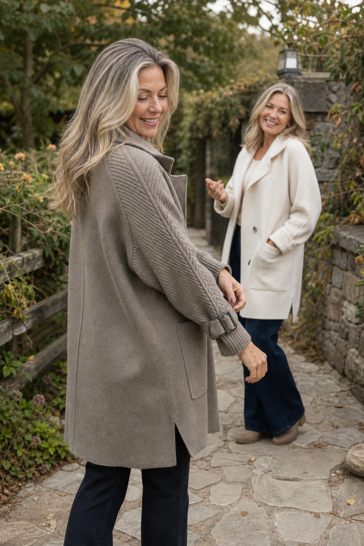 Women's longline coat with double-breasted buttons and cable-knit sleeves