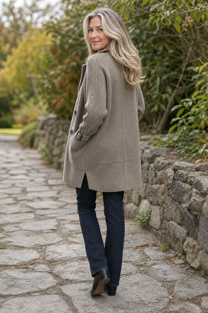 Women's longline coat with double-breasted buttons and cable-knit sleeves