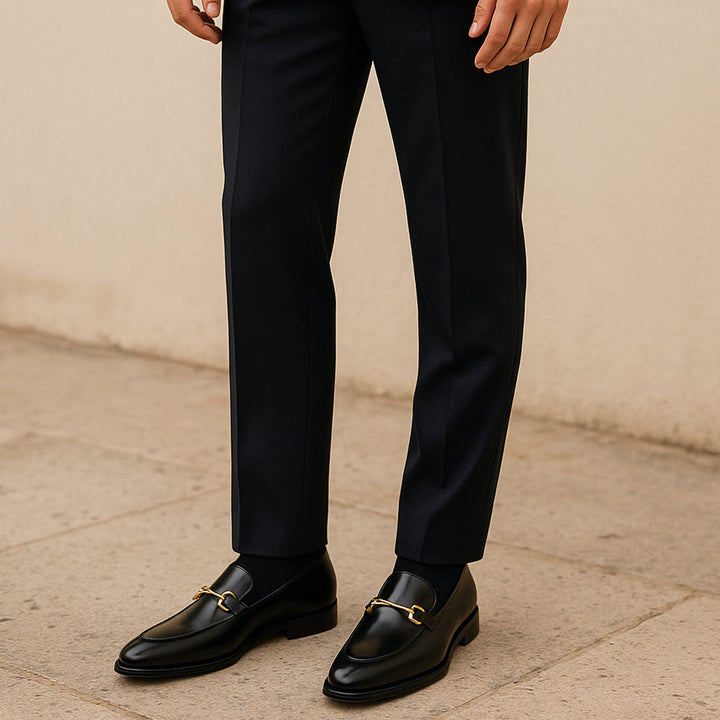 Men's black loafers with gold-tone horsebit detail
