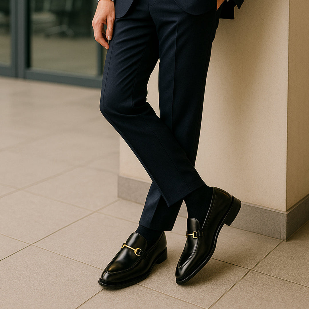 Men's black loafers with gold-tone horsebit detail