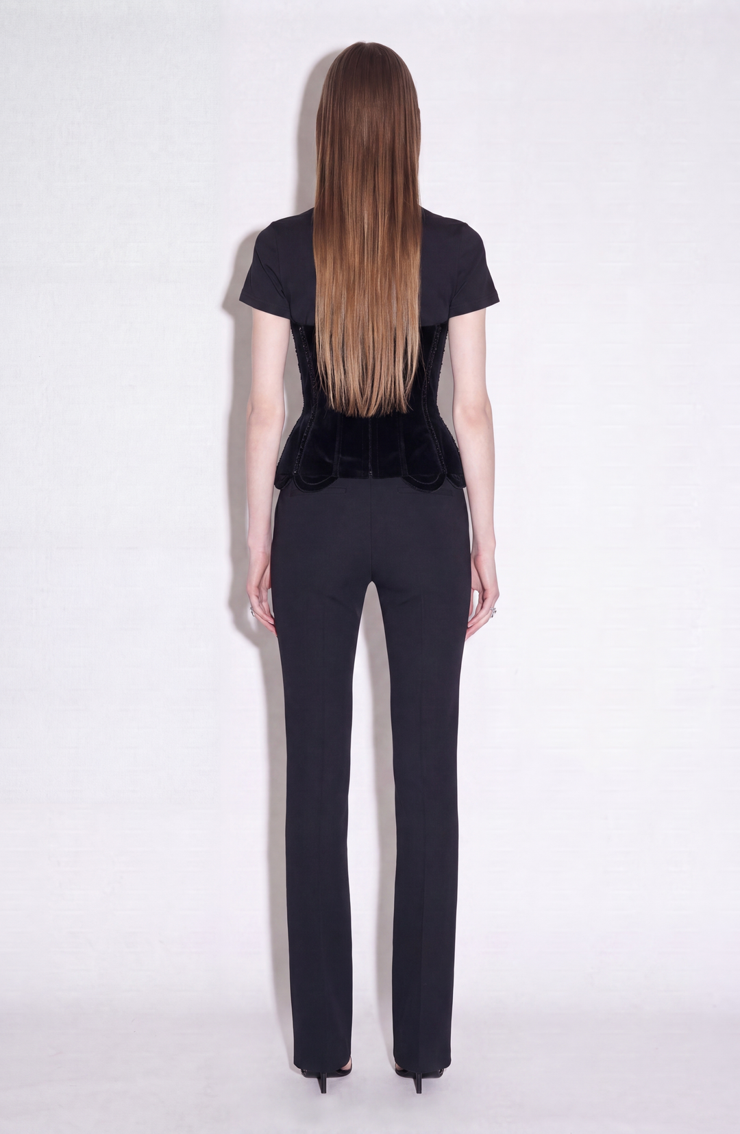 Black short-sleeved T-shirt with a velvet corset-style front panel