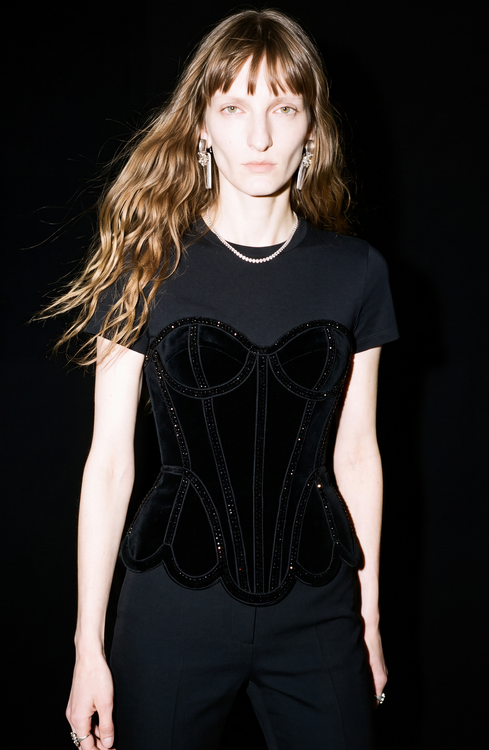 Black short-sleeved T-shirt with a velvet corset-style front panel