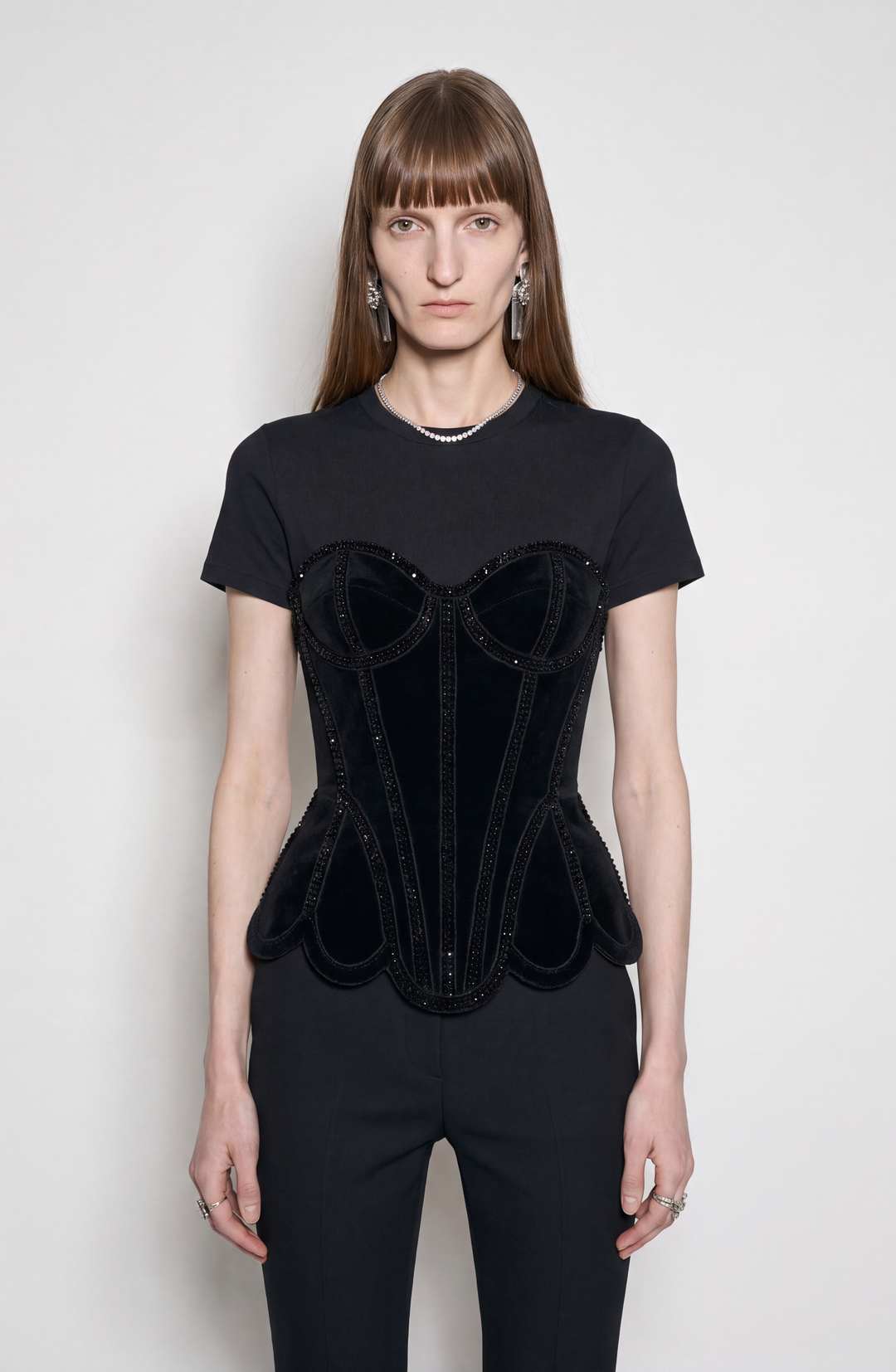 Black short-sleeved T-shirt with a velvet corset-style front panel