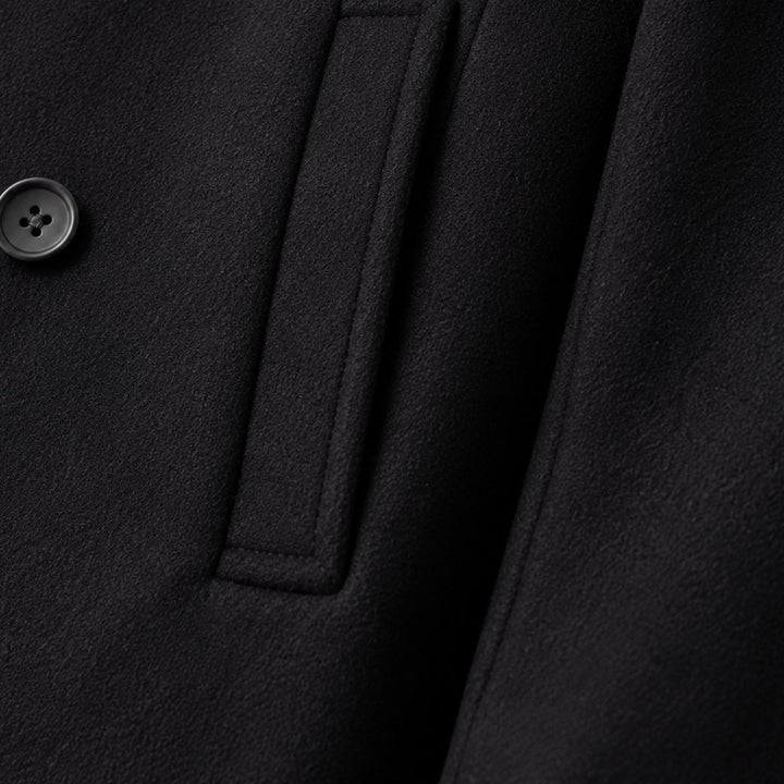 Men's black double-breasted peacoat with notched lapel and long sleeves