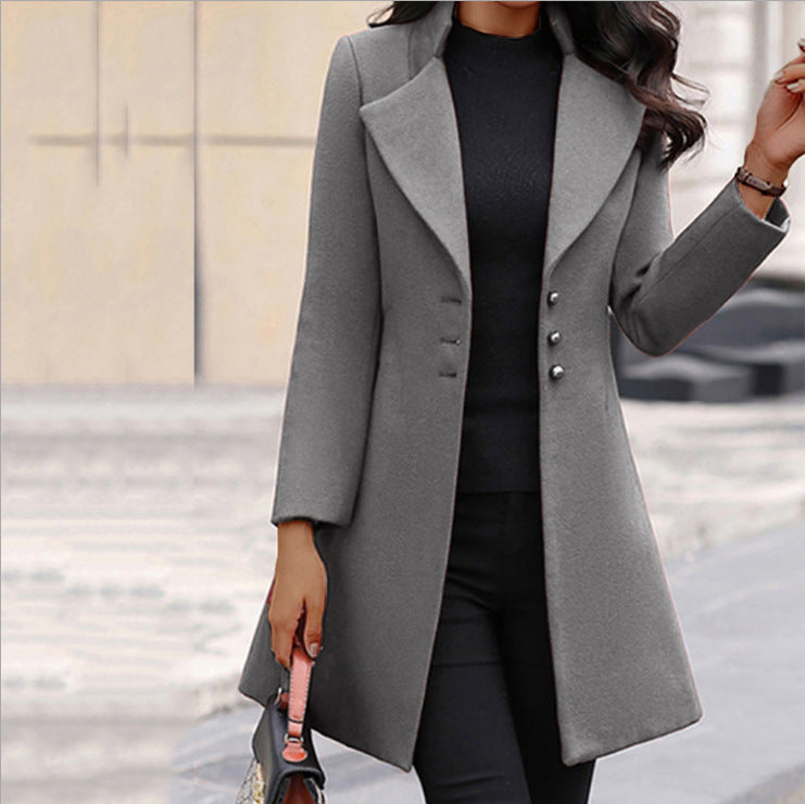 Women's long blazer coat with notched lapels and buttons