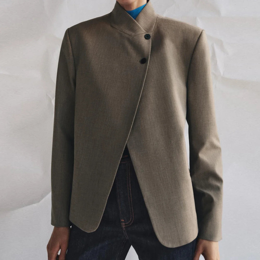 Women's collarless button blazer with long sleeves and front pockets