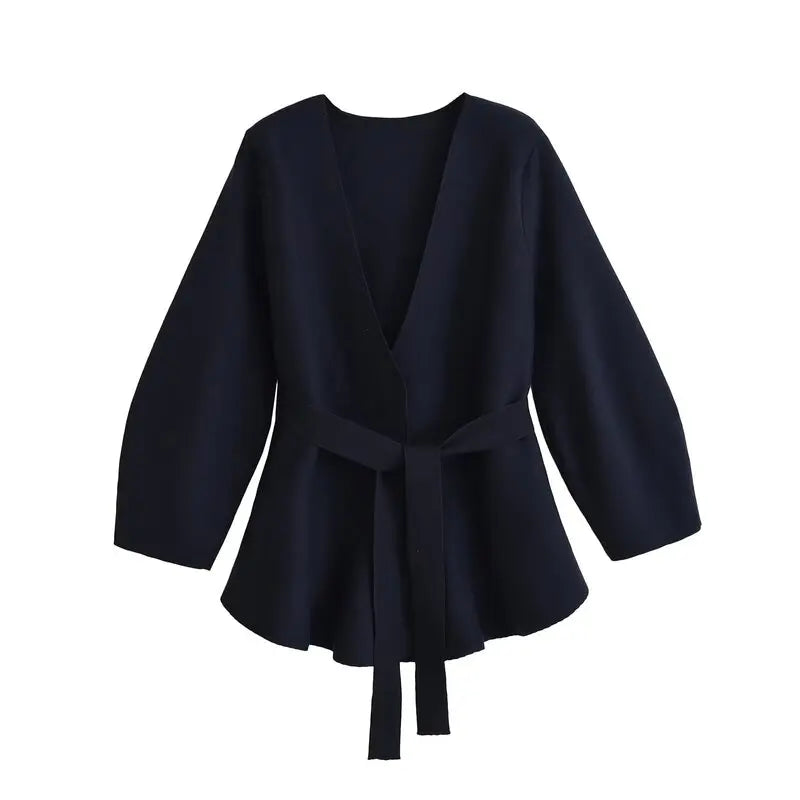 Women's wrap knit top with V-neckline, long sleeves and front tie waist