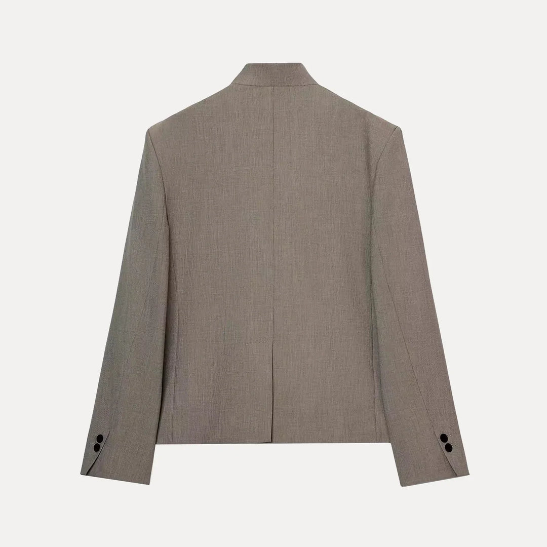 Women's collarless button blazer with long sleeves and front pockets