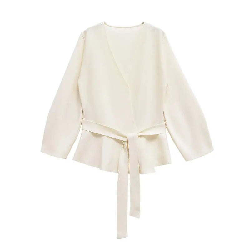 Women's wrap knit top with V-neckline, long sleeves and front tie waist