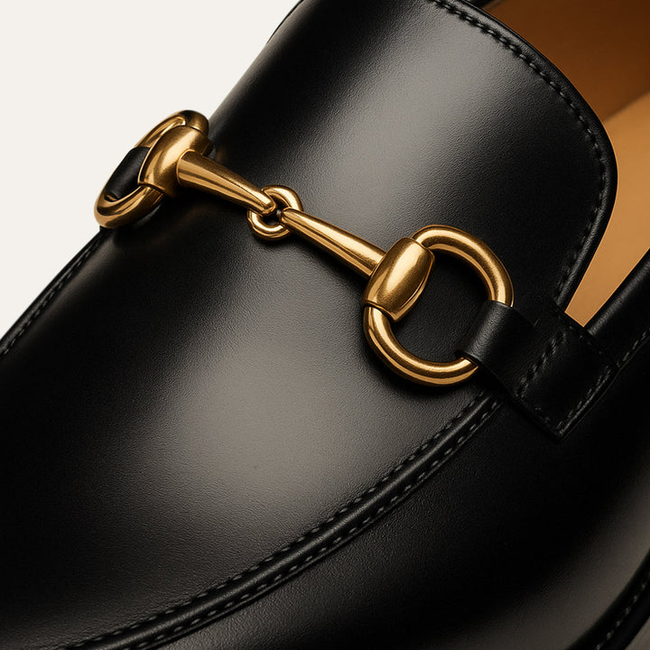 Men's black loafers with gold-tone horsebit detail