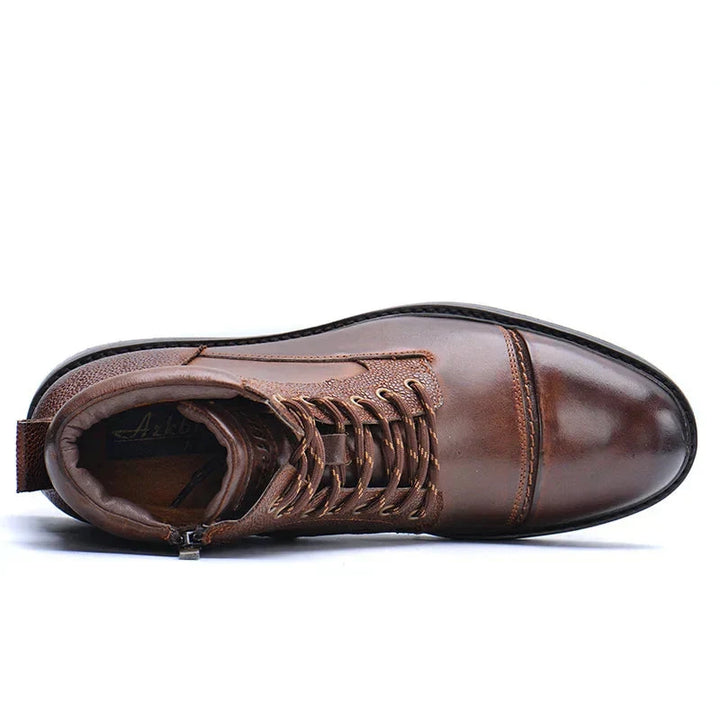Men's lace-up ankle boot with side zipper, round toe and treaded sole