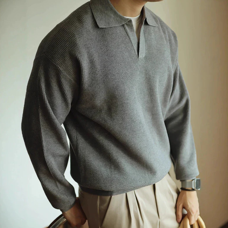 Men's long-sleeve textured polo sweater with collared V-neck and ribbed trims
