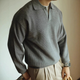 Men's long-sleeve textured polo sweater with collared V-neck and ribbed trims