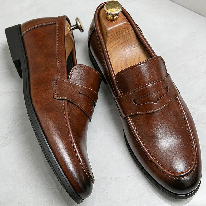 Men's penny strap loafers with rounded toes and low heels
