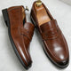 Men's penny strap loafers with rounded toes and low heels