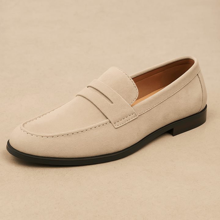 Men's penny loafers with moc toe stitching and low heel