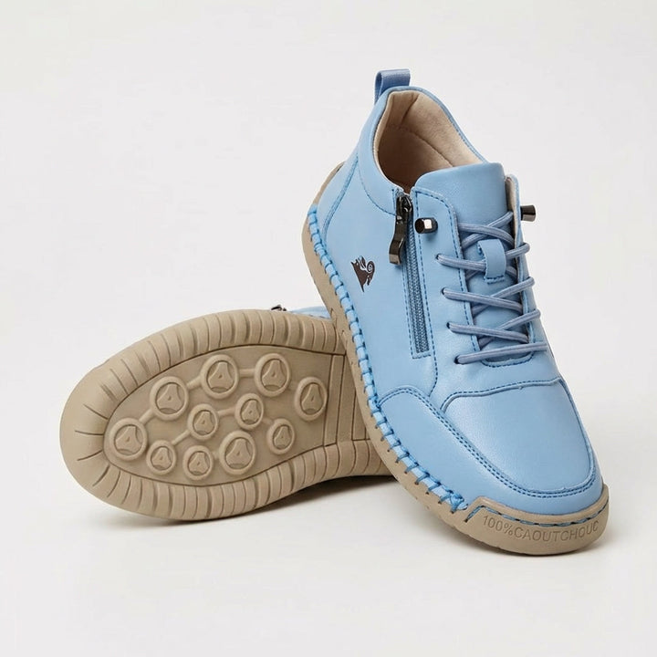 Women's lace-up trainers with side zip and flat textured sole
