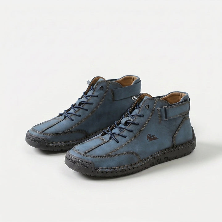 High-top lace-up sneakers with ankle straps, round toes and stitched panel detailing