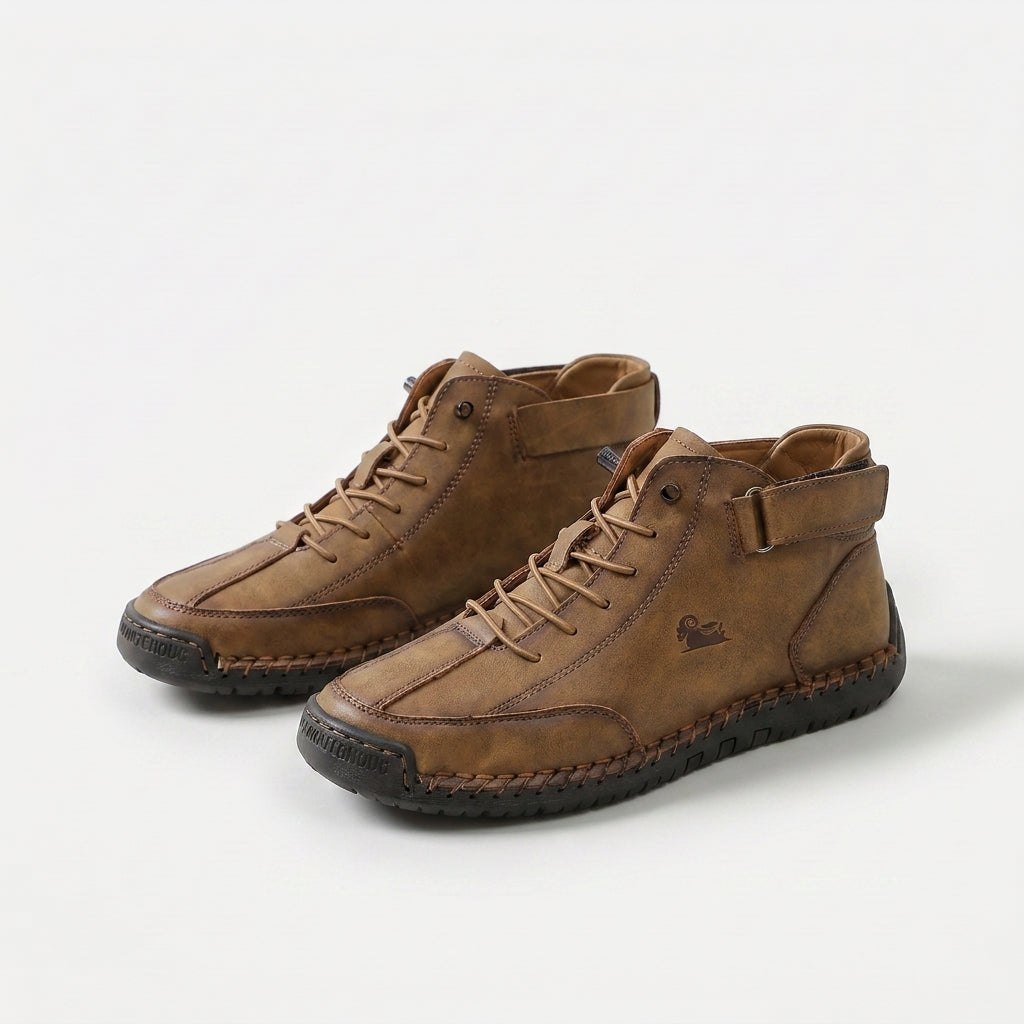 High-top lace-up sneakers with ankle straps, round toes and stitched panel detailing