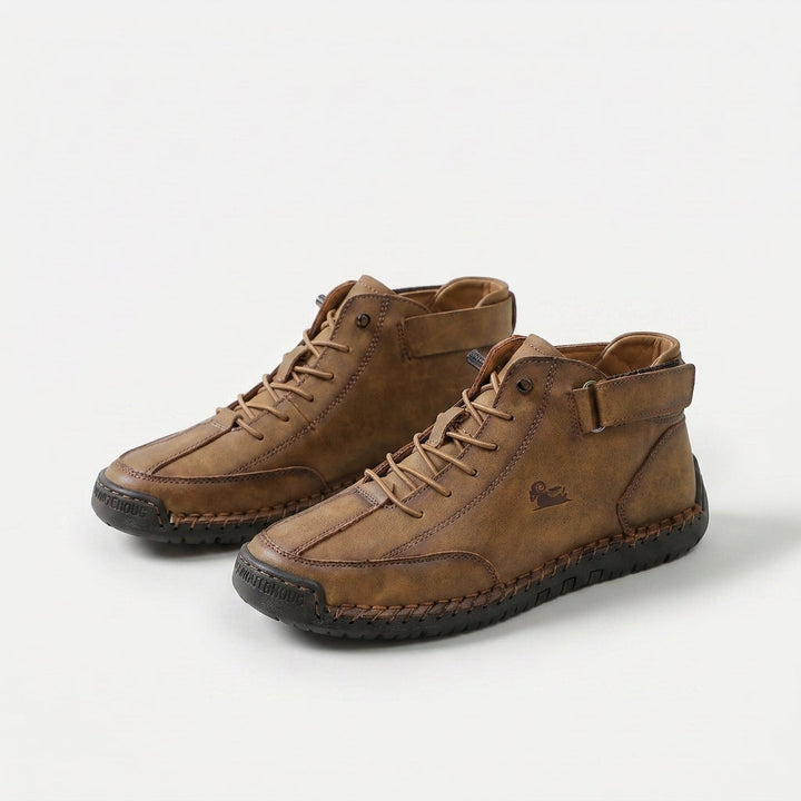 High-top lace-up sneakers with ankle straps, round toes and stitched panel detailing