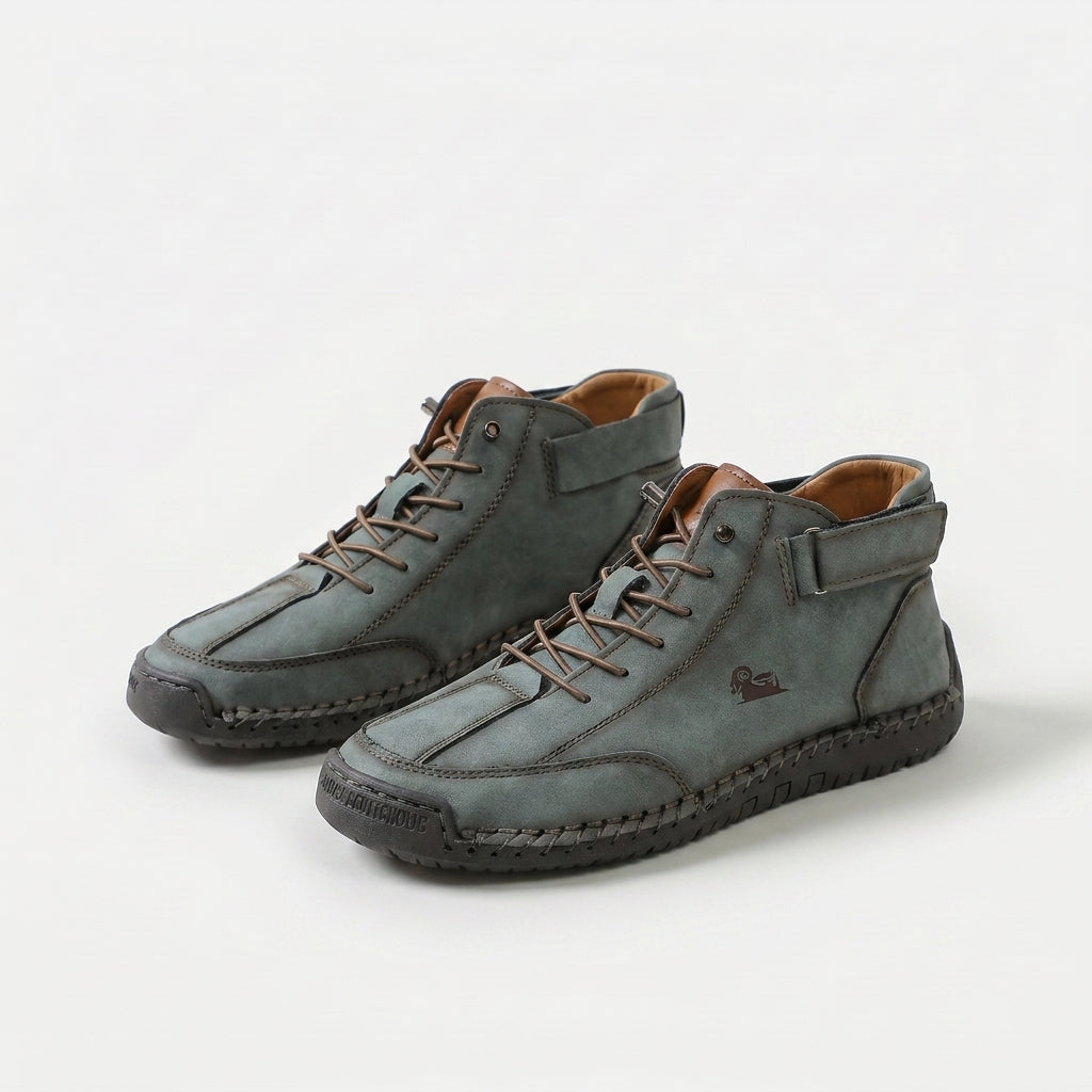 High-top lace-up sneakers with ankle straps, round toes and stitched panel detailing