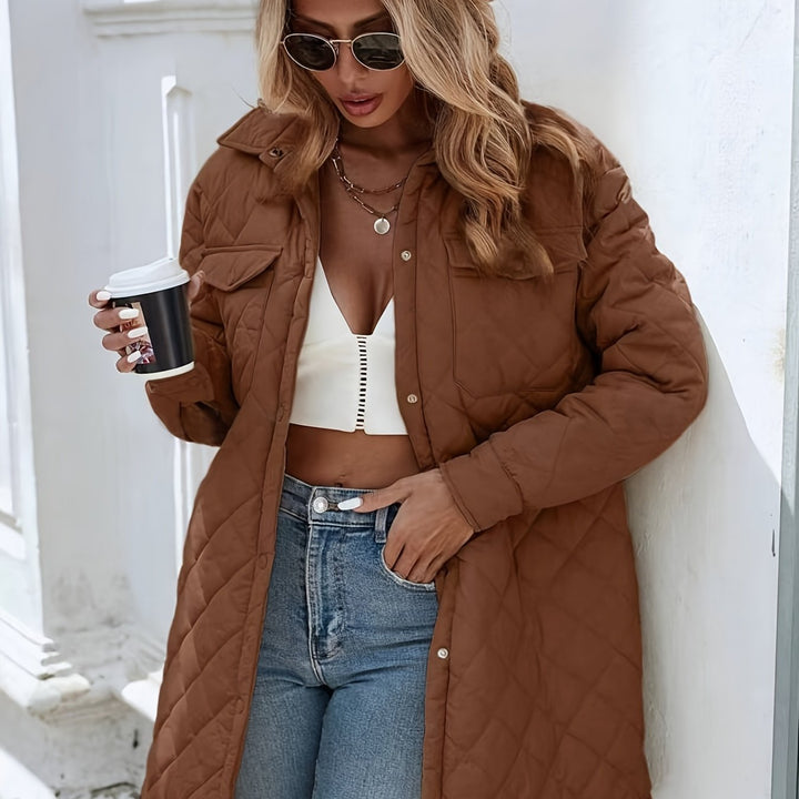 Women's brown longline quilted puffer jacket with snap buttons
