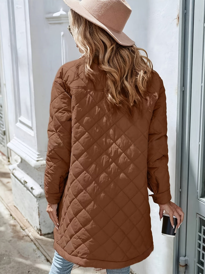 Women's brown longline quilted puffer jacket with snap buttons