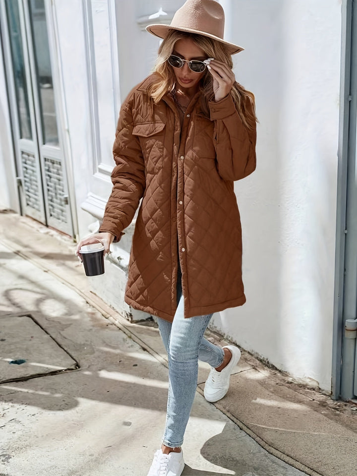 Women's brown longline quilted puffer jacket with snap buttons
