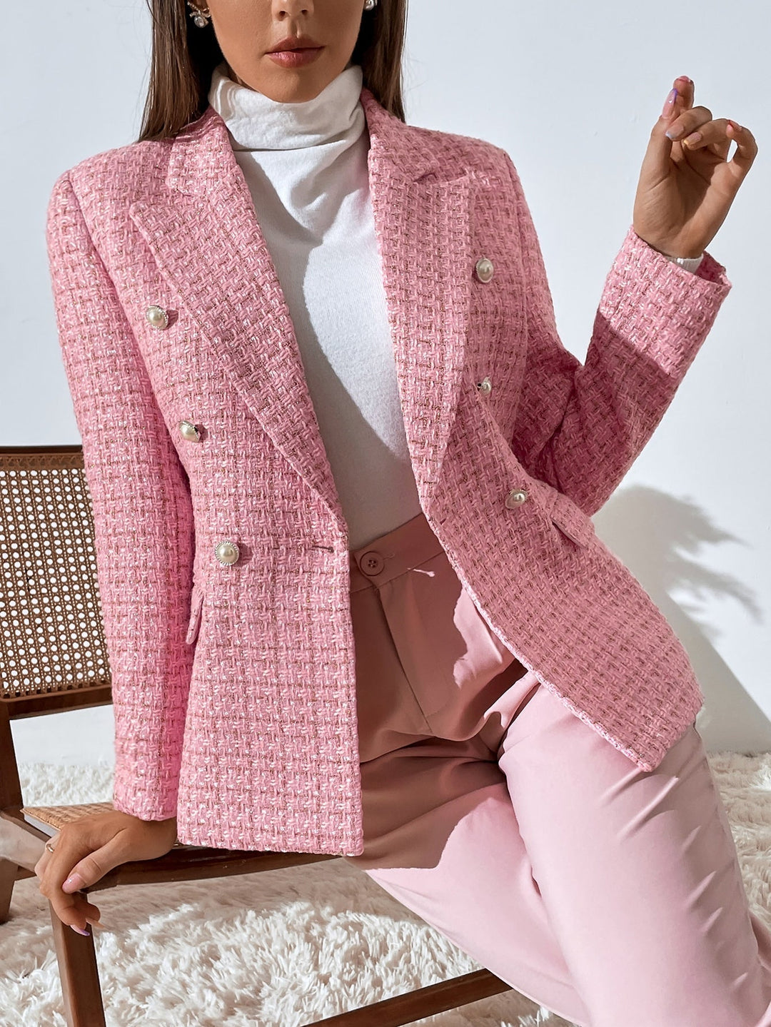 Women's checked tweed blazer with notched lapels and flap pockets