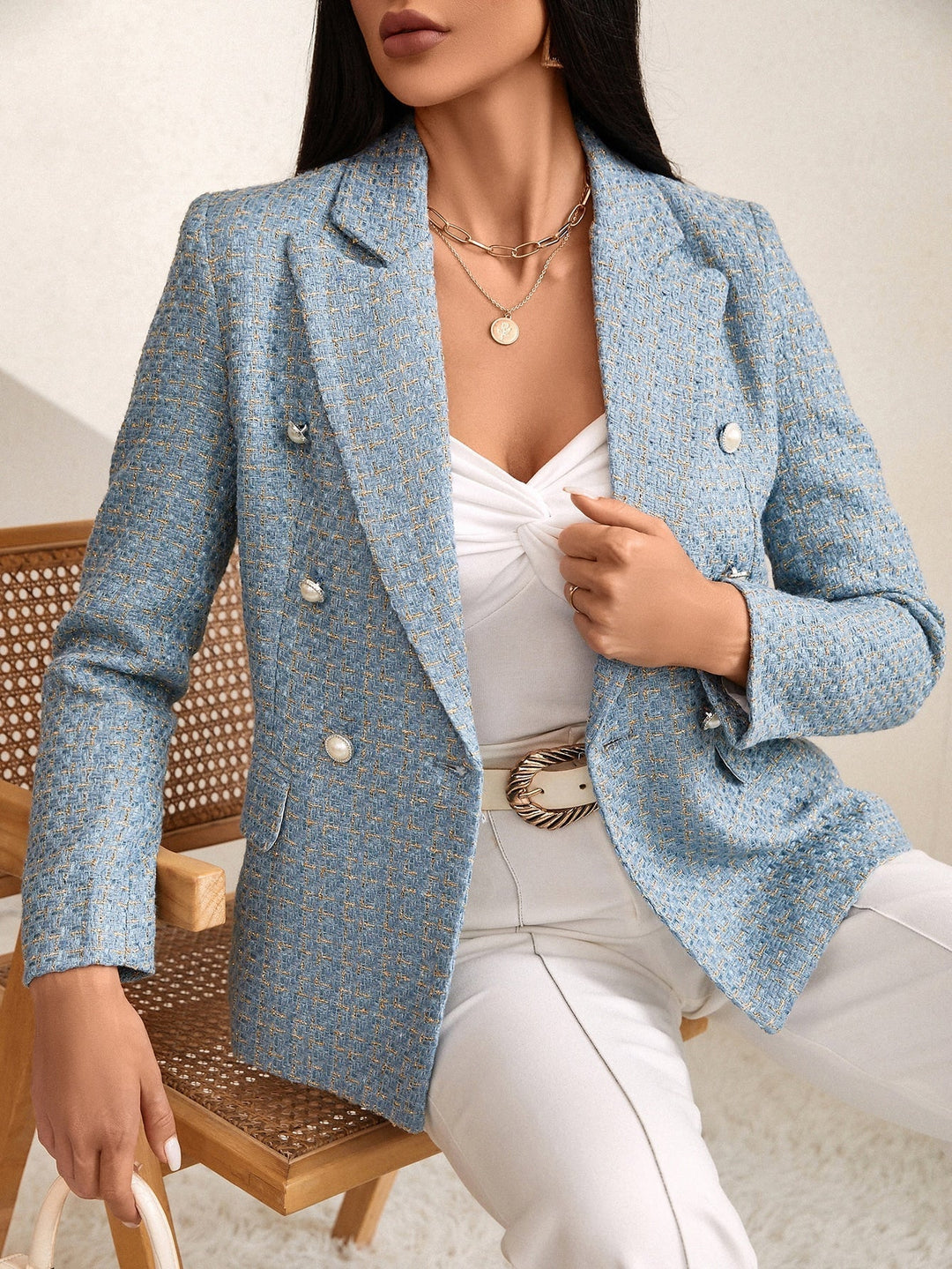 Women's checked tweed blazer with notched lapels and flap pockets