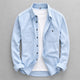 Men's long-sleeve denim shirt with pointed collar, button front and two chest pockets
