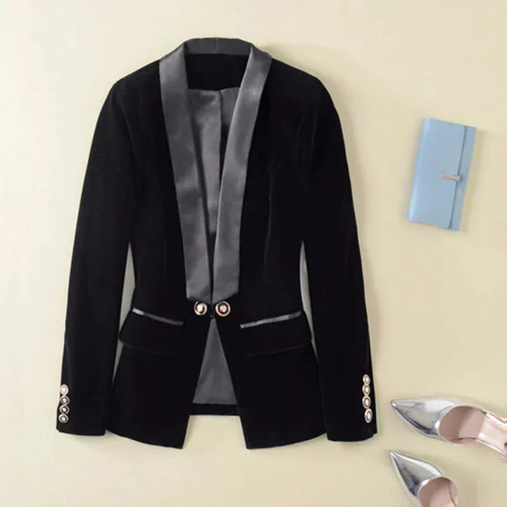 Women's dark textured blazer with glossy lapels, two buttons, flap pockets and long sleeves
