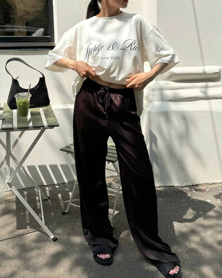 Women's high waist wide leg trousers with drawstring waist and full-length legs